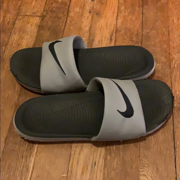 gray nike slides